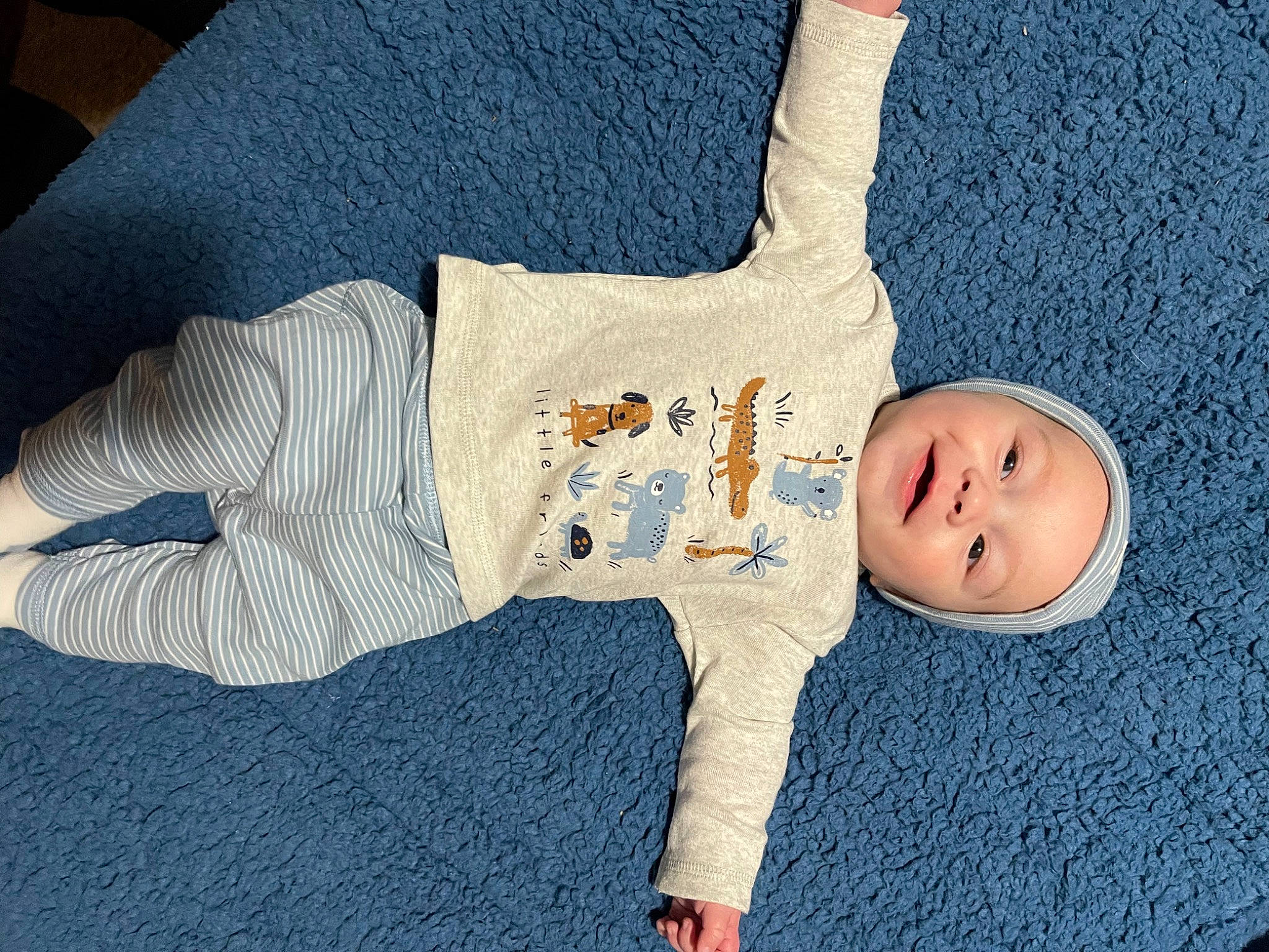 Bentlee is registered to the contest to win money with this photo: arm, baby, baby_products, baby_toddler_clothing, comfort, eye, finger, hand, happy, hat, headwear, human_body, leg, linens, person, sleeve, smile, stuffed_toy, textile, thumb