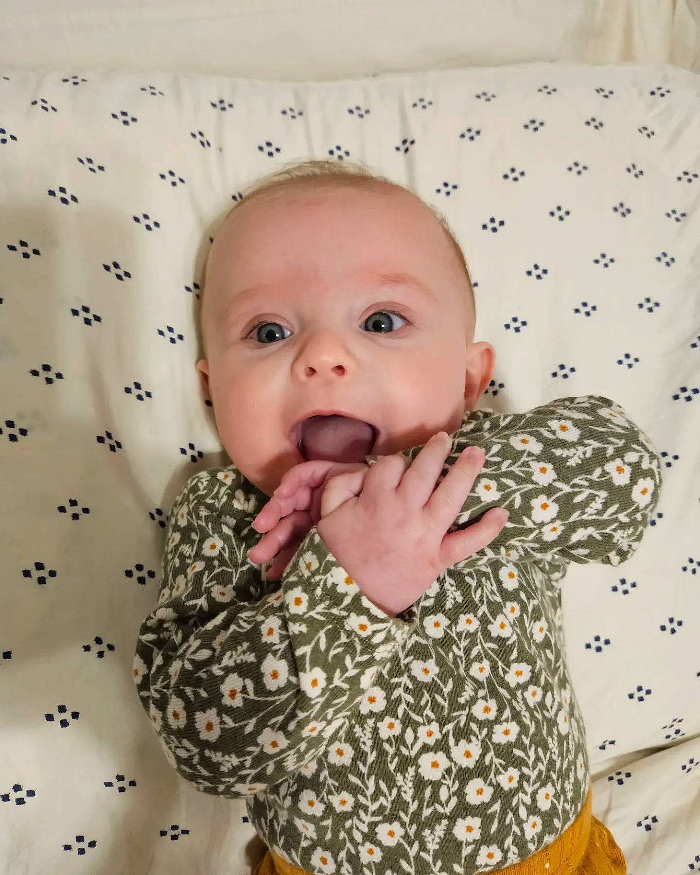 Kinsley is registered to the contest to win money with this photo: baby, baby_toddler_clothing, cheek, child, collar, comfort, eye, eyebrow, happy, head, iris, linens, lip, mouth, nose, pattern, person, skin, sleeve, textile