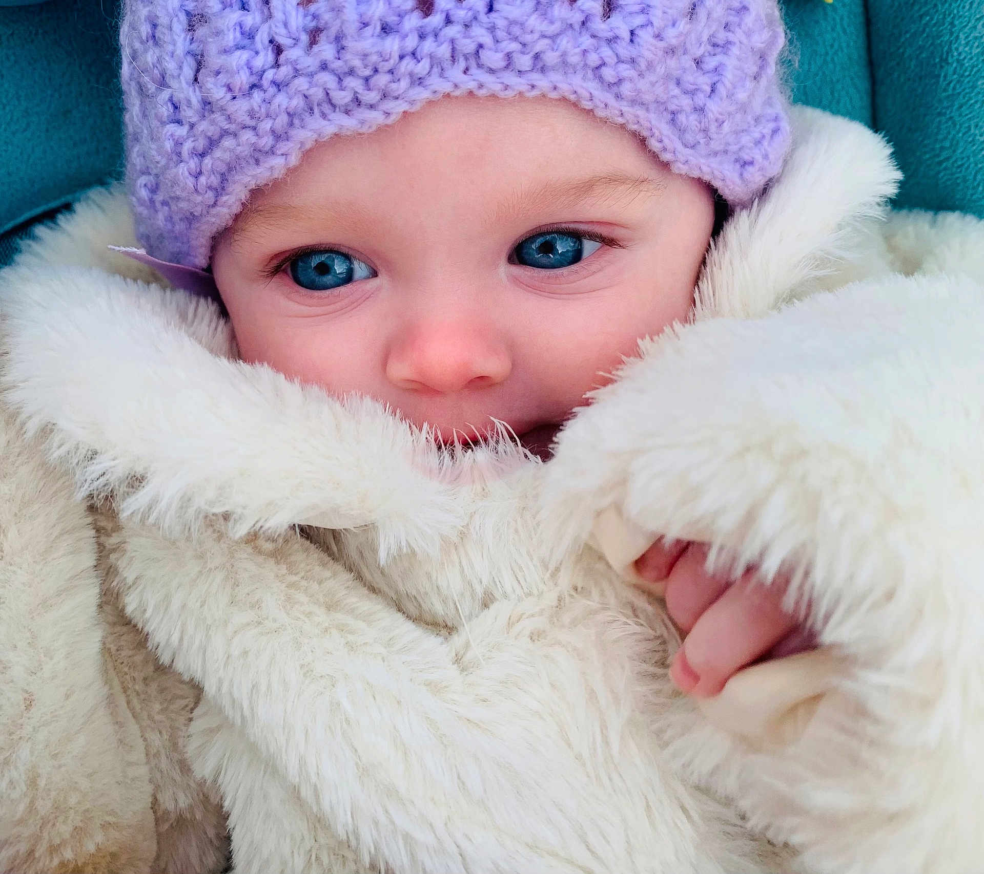 Dorothea joined the competition — help win amazing prizes! baby, blue_eyes, coat, fluffy, hat, knit, lavender, close_up, child, cute, face, fingers, fur, glance, hand, infant, portrait, skin, warm_clothing, winter