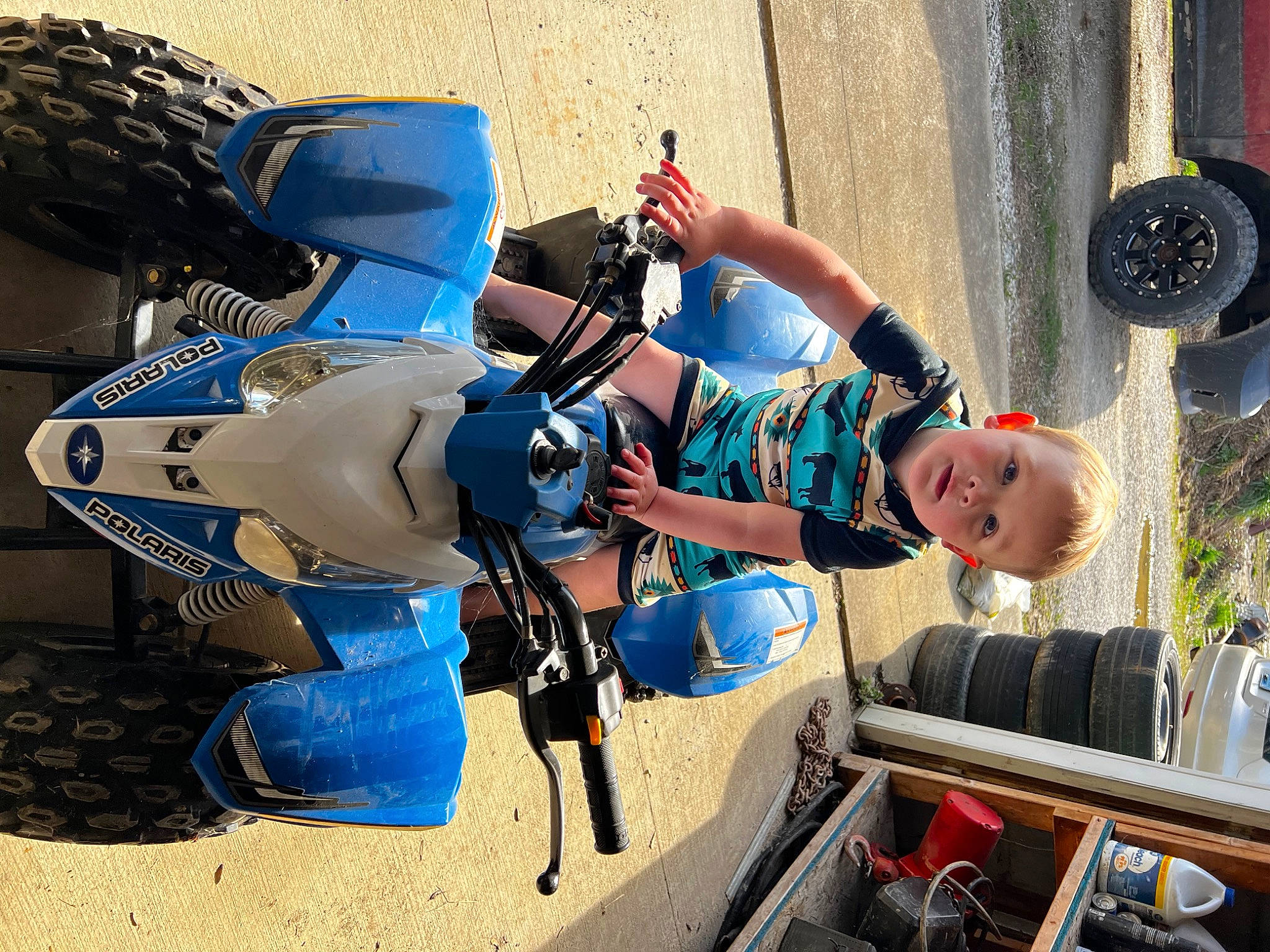 Kamryn is registered to the contest to win money with this photo: adventure, auto_part, automotive_design, automotive_exterior, automotive_tire, automotive_wheel_system, electric_blue, fun, glove, hat, helmet, leisure, luggage_and_bags, machine, motor_vehicle, person, personal_protective_equipment, recreation, tire, vehicle