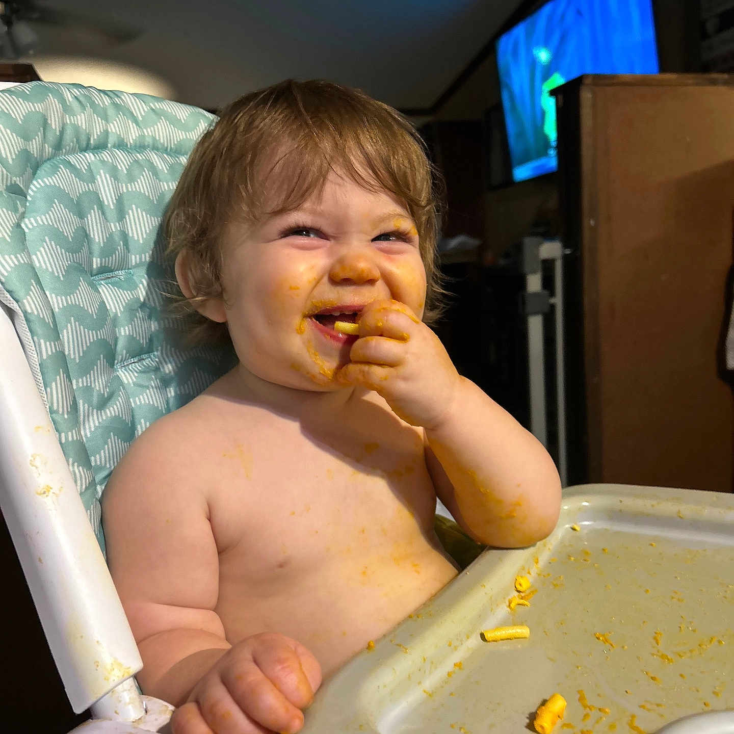 Grayson is registered to the contest to win money with this photo: baby, bodypart, chair, computerhardware, cutlery, eating, electronics, face, finger, food, furniture, hand, hardware, head, monitor, person, photography, portrait, screen, tv