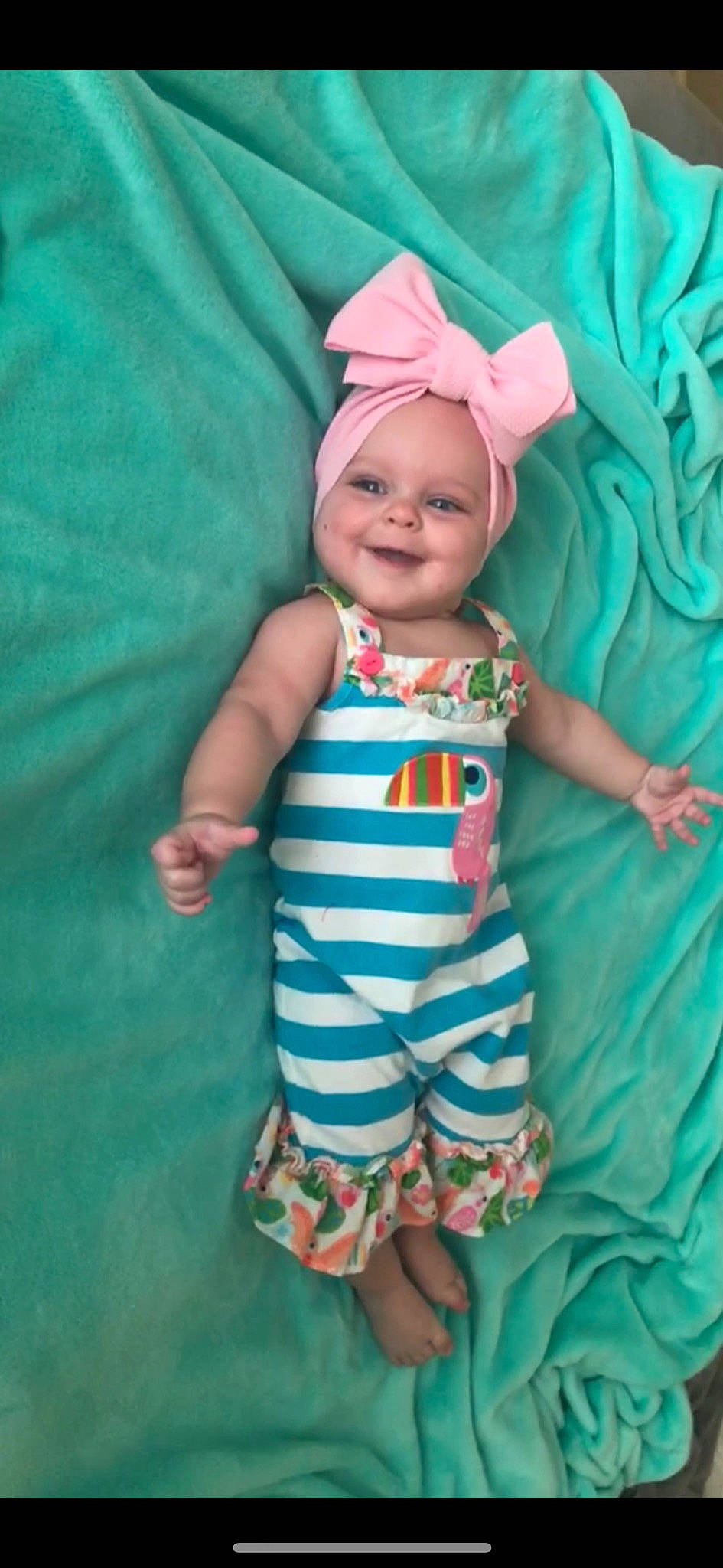 Leighton joined the competition — help win amazing prizes! aqua, baby, baby_products, baby_toddler_clothing, child, headgear, headwear, joy, pattern, person, product, toddler, turquoise