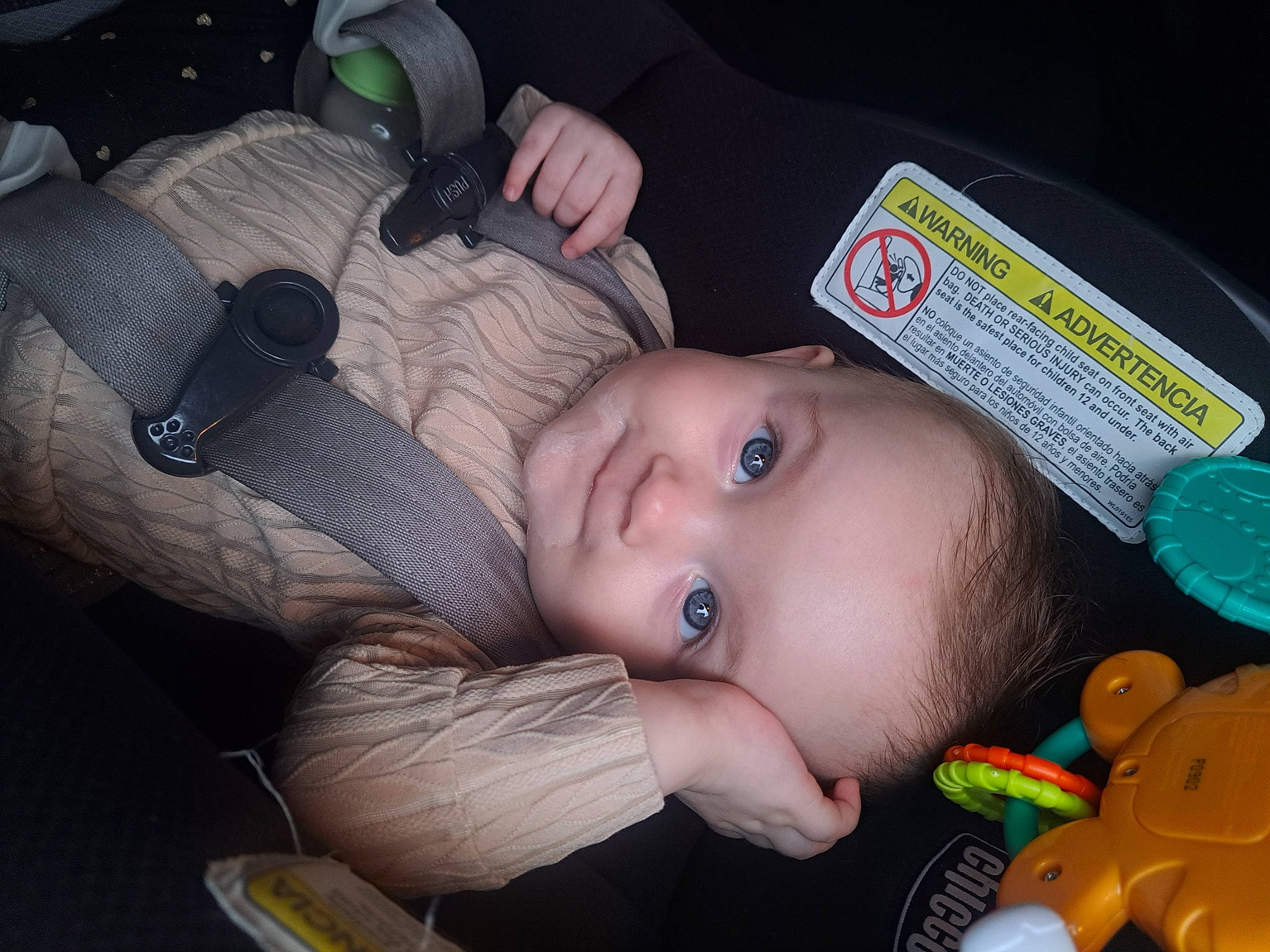 Emerald is registered to the contest to win money with this photo: baby, baby_carriage, baby_products, bag, car_seat, cheek, child, comfort, ear, eyelash, finger, fun, hand, mouth, nail, nose, person, sitting, skin, toddler