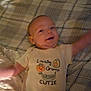 Aurora joined the competition — help win amazing prizes! baby, bed, blanket, child, clothing, comfort, cozy, cute, fabric, face, happy, indoor, infant, lying_down, onesie, person, plaid_blanket, small_child, smiling, soft_lighting