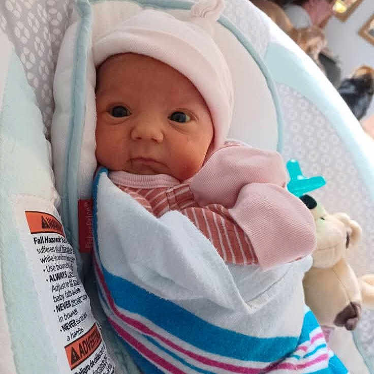 Savanna joined the competition — help win amazing prizes! adult, baby, blanket, face, female, head, infantbed, newborn, person, woman