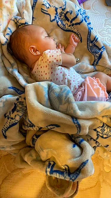 Onyx Rose joined the competition — help win amazing prizes! baby, baby_products, baby_safety, baby_sleeping, baby_toddler_clothing, bedding, bedtime, blanket, blue, child, comfort, linens, nap, pattern, peach, person, room, skin, sleep, textile