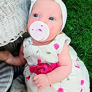 Arabella joined the competition — help win amazing prizes! baby, pacifier, headband, dress, flower, grass, wicker_chair, child, infant, outdoor, cute, pink, white, blue_eyes, hand, person, portrait, summer, nature, baby_girl