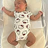 Jadeyn joined the competition — help win amazing prizes! baby, sleeping, infant, onesie, hello_kitty, cute, cushion, white, soft, small, child, peaceful, resting, sock, mesh, fabric, comfort, indoors, portrait, relaxation