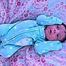 Naiely is registered to the contest to win money with this photo: aqua, azure, baby, baby_sleeping, baby_toddler_clothing, bedding, bedtime, child, comfort, electric_blue, grass, linens, magenta, nap, pattern, pink, purple, sleeve, textile, toddler