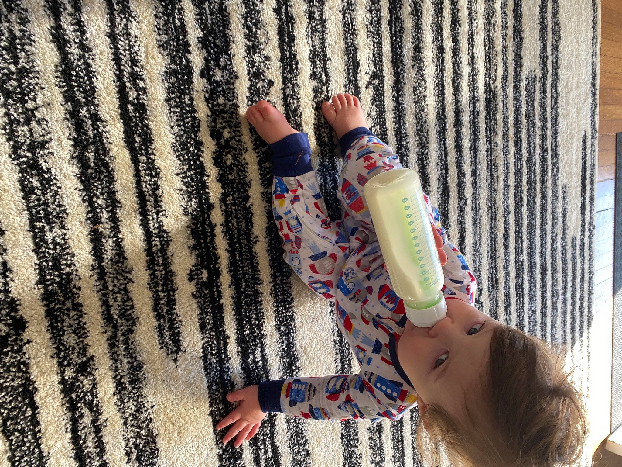 Philip is registered to the contest to win money with this photo: art, carmine, denim, drink, electric_blue, finger, flooring, foot, hand, human_leg, line, nail, pattern, person, street_fashion, textile, thigh, thumb, tints_and_shades, toe