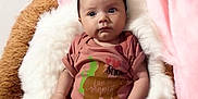 Tesssa is registered to the contest to win money with this photo: baby, infant, onesie, pink, blanket, soft, fur, bed, cozy, cute, child, portrait, sleeping_area, newborn, clothing, indoor, person, relaxing, young, expression