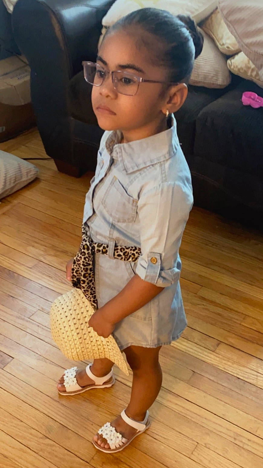 Naelisha is registered to the contest to win money with this photo: baby_toddler_clothing, child, eyewear, face, fashion_design, floor, flooring, glasses, hair, happy, hardwood, head, human_leg, knee, person, sleeve, thigh, toddler, vision_care, waist