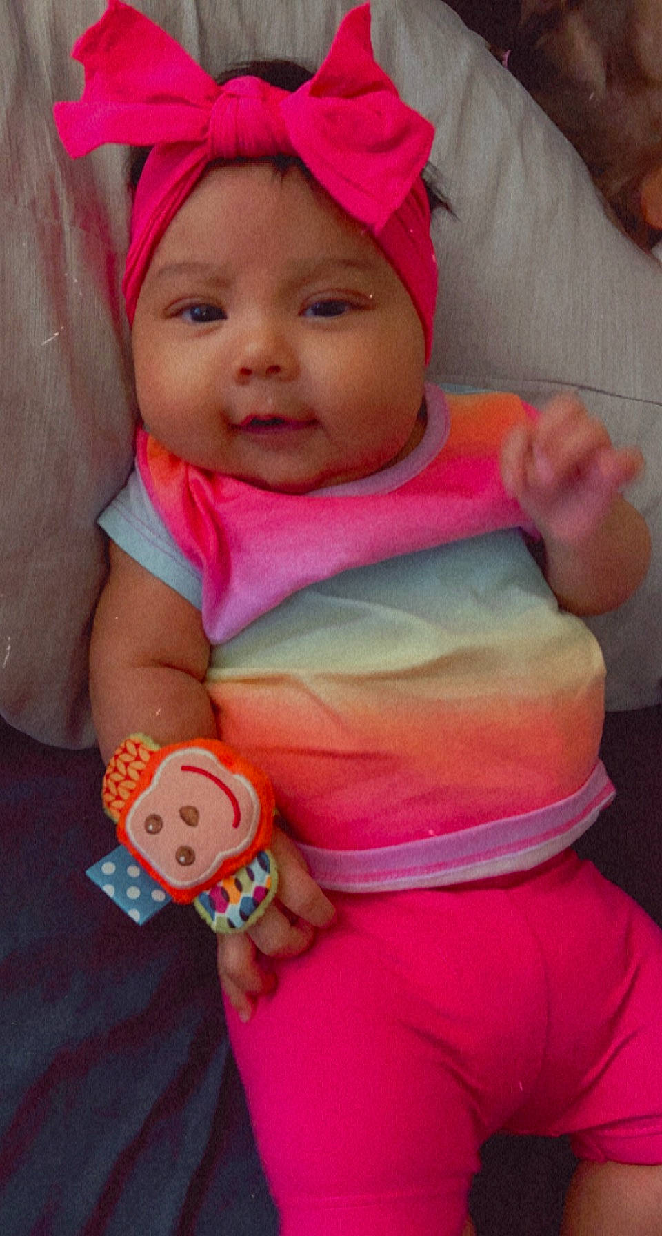 Alani is registered to the contest to win money with this photo: arm, baby_toddler_clothing, cheek, chin, eye, face, facial_expression, hairstyle, hand, happy, head, headwear, human, lip, mouth, nose, organ, person, product, skin