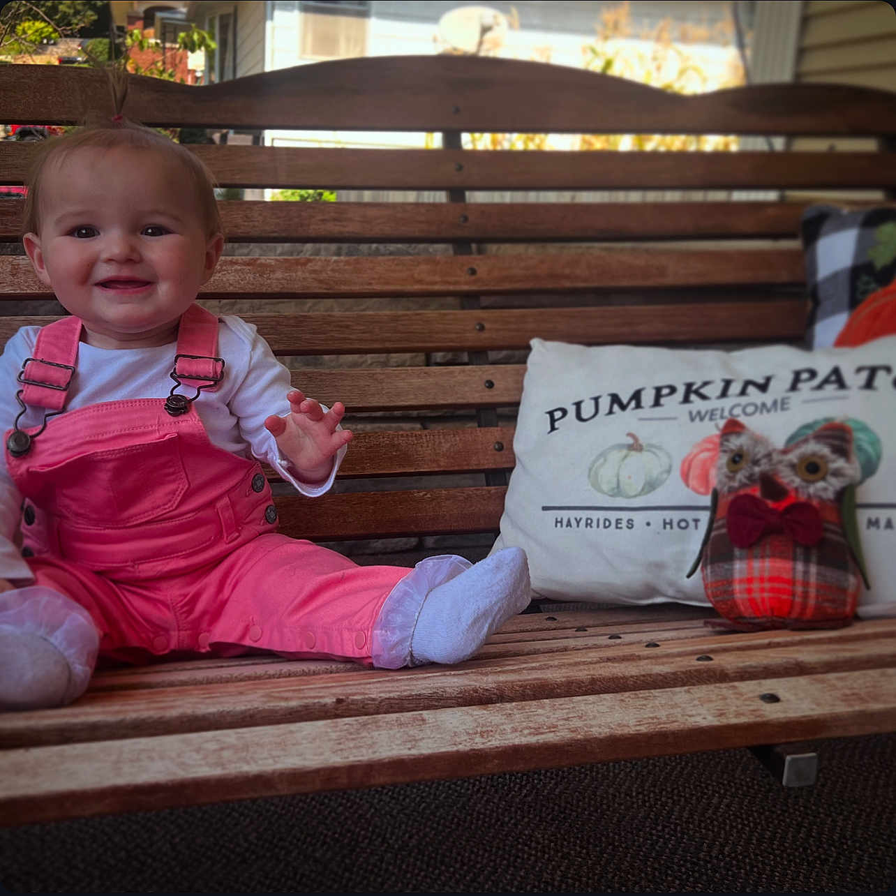 Raelyn joined the competition — help win amazing prizes! animal, baby, bench, bird, bodypart, clothing, couch, face, finger, furniture, hand, hardwood, head, hosiery, pants, person, photography, portrait, sitting, wood
