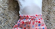 Gwen joined the competition — help win amazing prizes! arms_up, baby, barefoot, carpet, child, clothing, cute, happy, head, indoors, infant, legs, lying_down, onesie, patterned_shorts, person, pink_shorts, skin, smiling, toddler