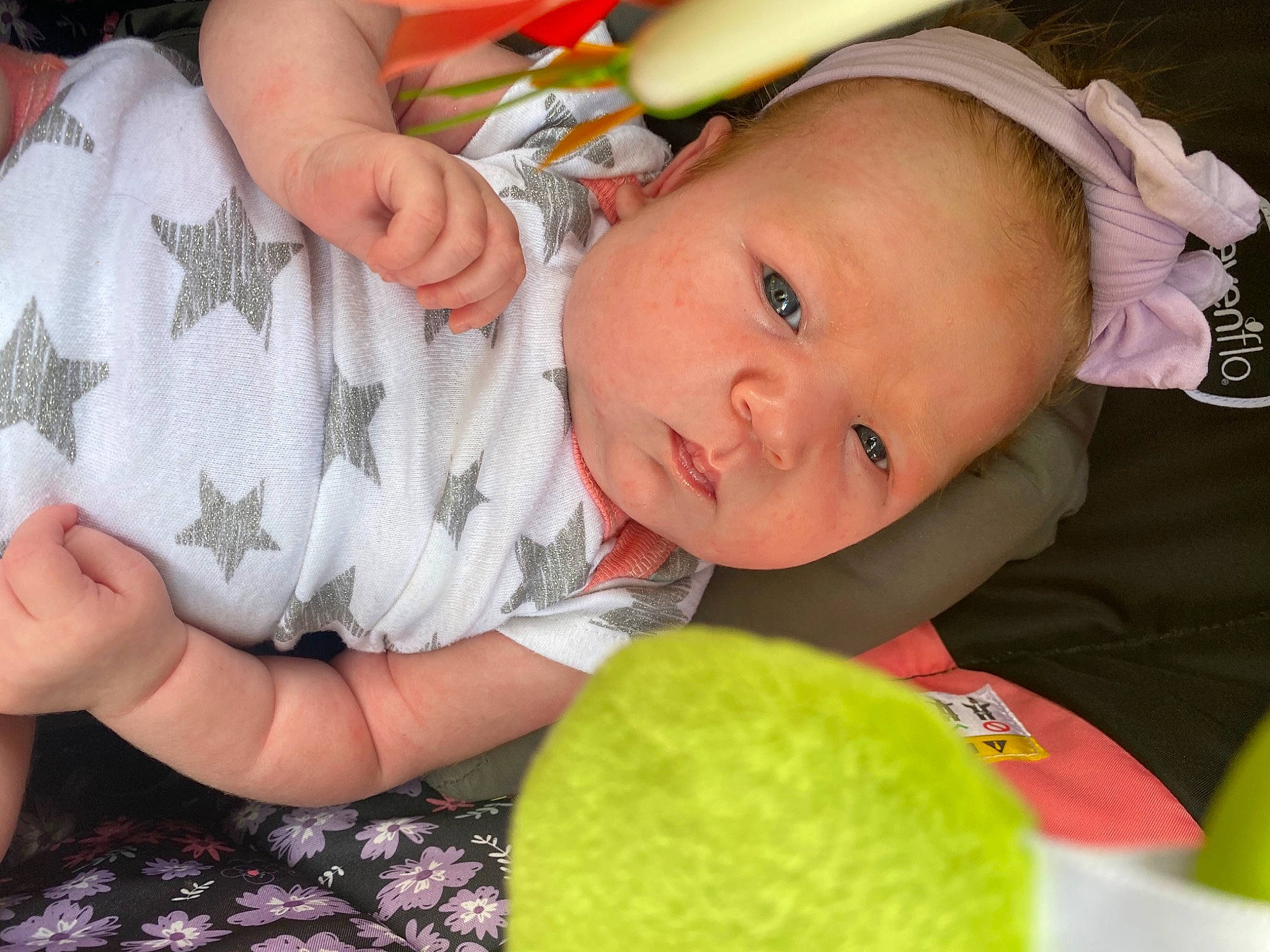 Danni is registered to the contest to win money with this photo: baby, baby_products, baby_toddler_clothing, cheek, child, facial_expression, finger, fun, green, hand, happy, iris, mouth, nail, nose, person, product, skin, thumb, toddler
