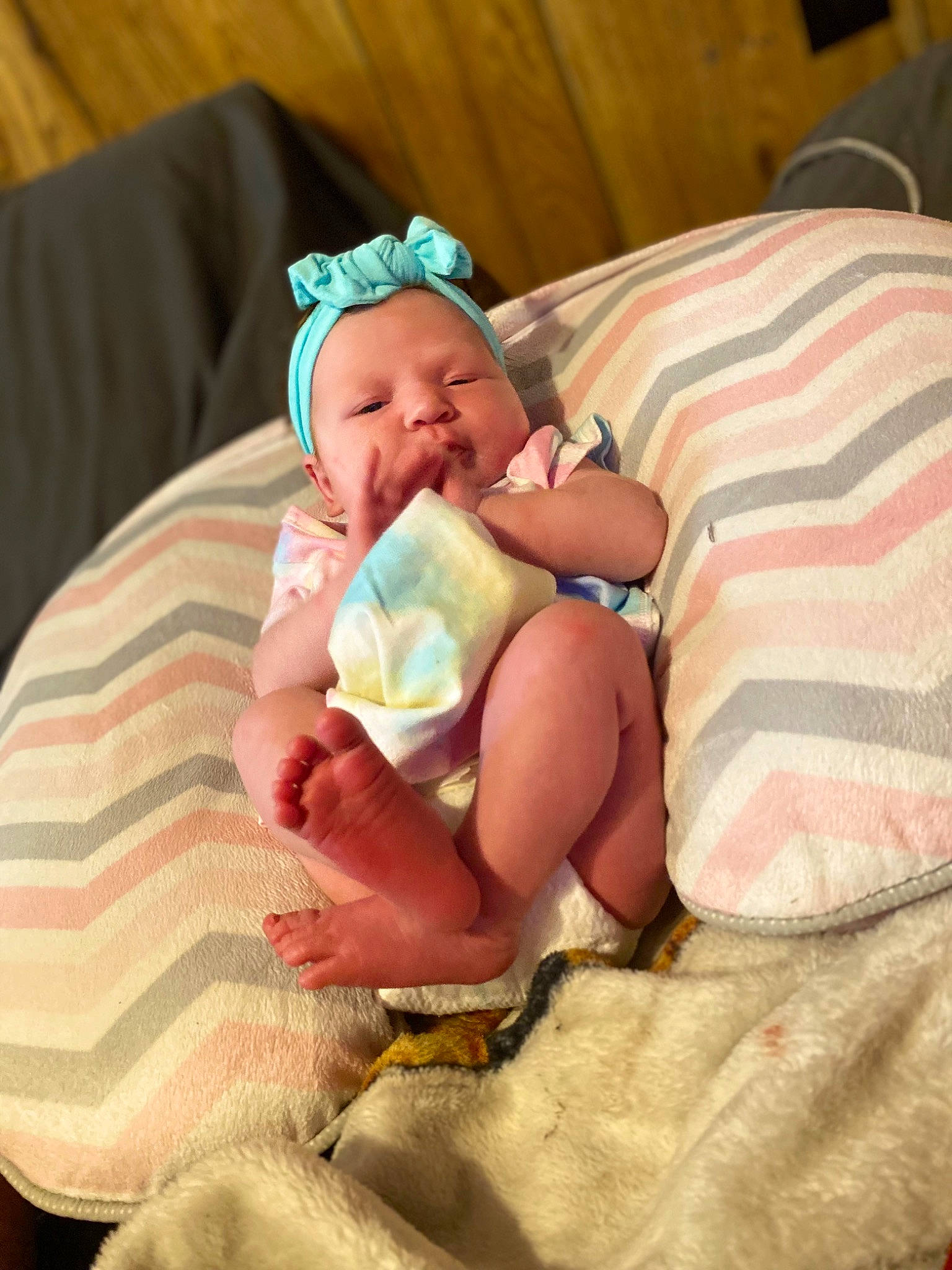 Jullianna is registered to the contest to win money with this photo: baby, baby_products, baby_sleeping, baby_toddler_clothing, cheek, child, comfort, couch, fedora, finger, foot, happy, hat, human_leg, lap, linens, person, sitting, skin, thigh