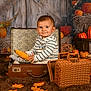 Tiago participe au concours pour gagner de l'argent avec cette photo : baby, child, suitcase, corn, pumpkin, autumn, fall_leaves, hay, smile, striped_shirt, indoor, cozy, seasonal, cute, portrait, vintage, wicker_basket, brown_rug, decor, playful