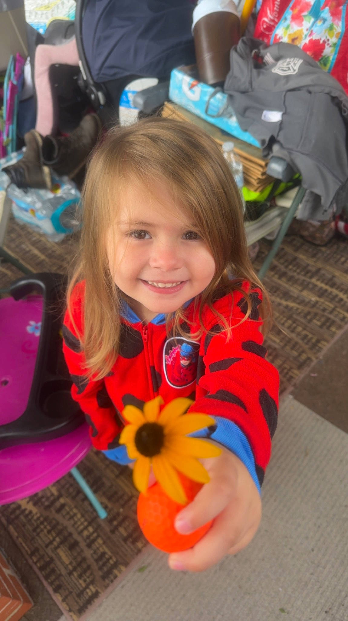 Michaela joined the competition — help win amazing prizes! baby, chair, child, event, eye, facial_expression, fun, happy, iris, joy, leisure, person, petal, photograph, plant, recreation, shoe, sitting, smile, toddler