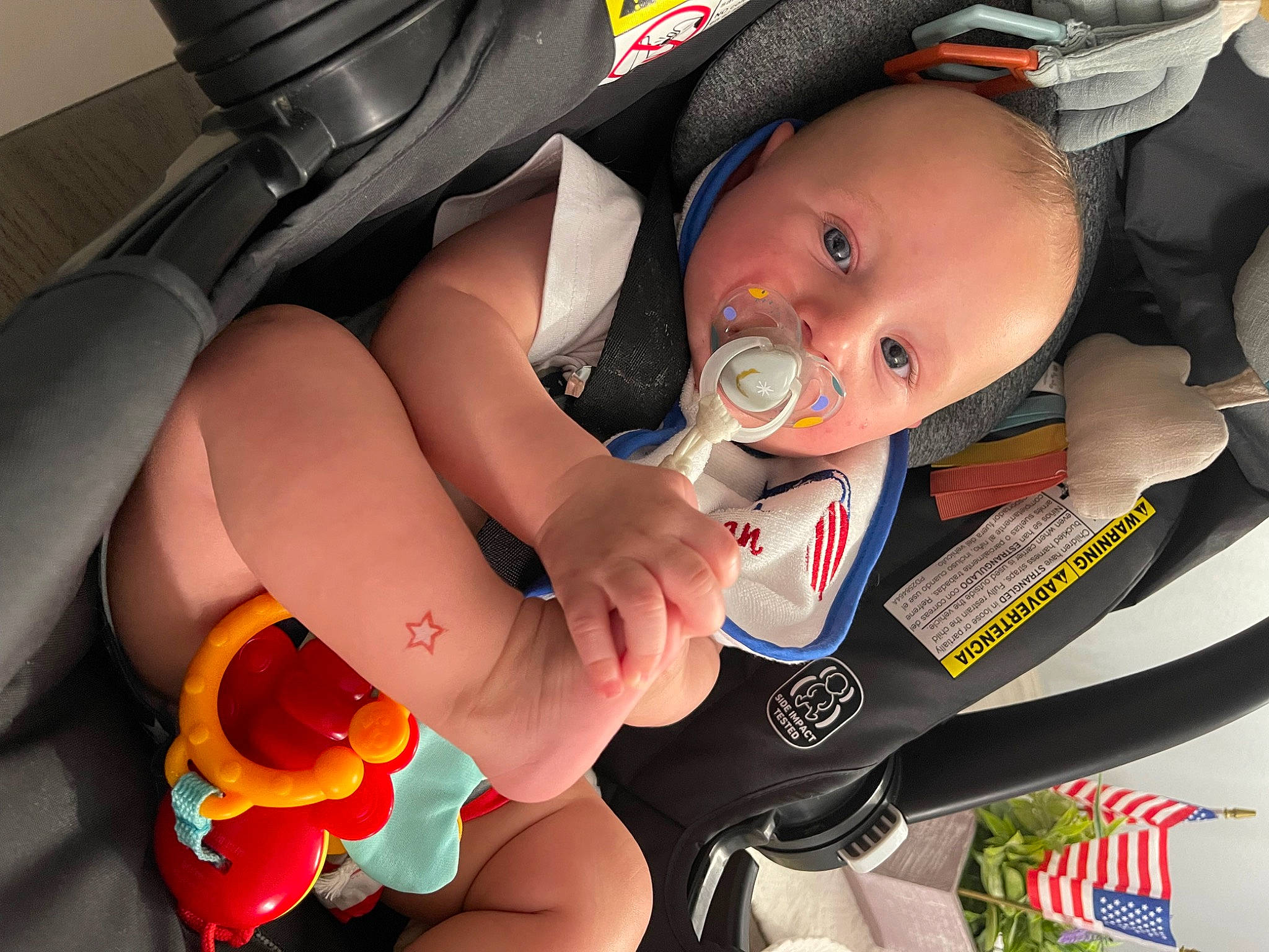 Mylo is registered to the contest to win money with this photo: auto_part, baby, baby_carriage, baby_in_car_seat, baby_products, car_seat, carmine, child, comfort, finger, fun, human_leg, mouth, nail, person, seat_belt, steering_wheel, thigh, thumb, toddler
