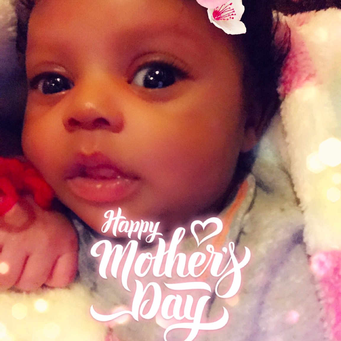 Emiliana is registered to the contest to win money with this photo: baby, beauty, cheek, child, eye, eyebrow, face, forehead, hair_accessory, head, headband, headgear, headpiece, lip, nose, person, petal, photography, pink, skin
