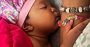 Reign joined the competition — help win amazing prizes! baby, sleeping, blanket, pink, bonnet, unicorn, earring, hand, bracelet, bed, pillow, arm, skin, closeup, cozy, rest, infant, cute, peaceful, tenderness