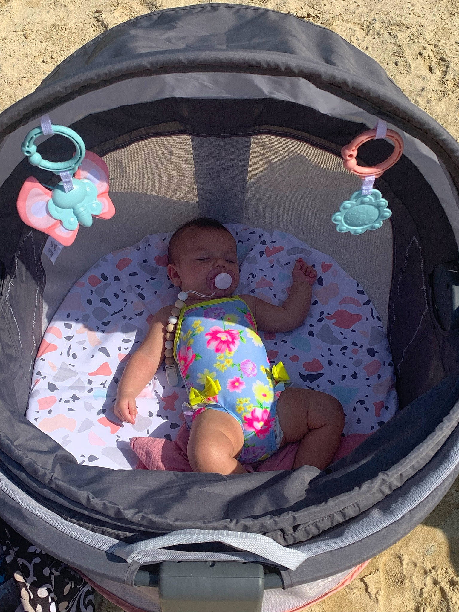 Harlowe is registered to the contest to win money with this photo: baby, baby_products, baby_toddler_clothing, beauty, child, circle, comfort, fun, grass, landscape, leisure, pattern, person, play, product, recreation, rock, sitting, toddler, vacation