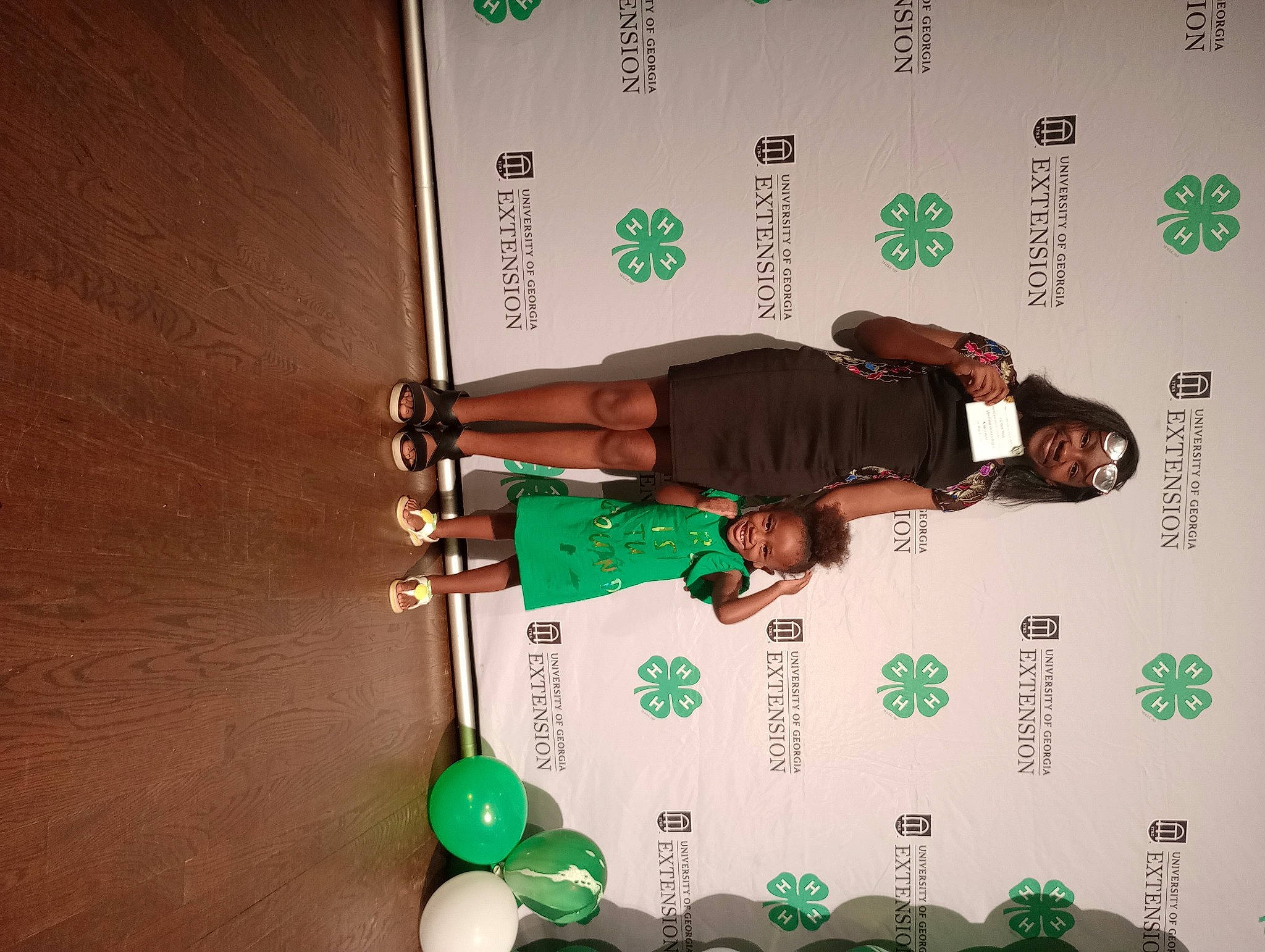 Allilla is registered to the contest to win money with this photo: arm, ball, elbow, event, font, fun, joy, leg, person, room, sleeve, t_shirt, thigh, wood, wrist