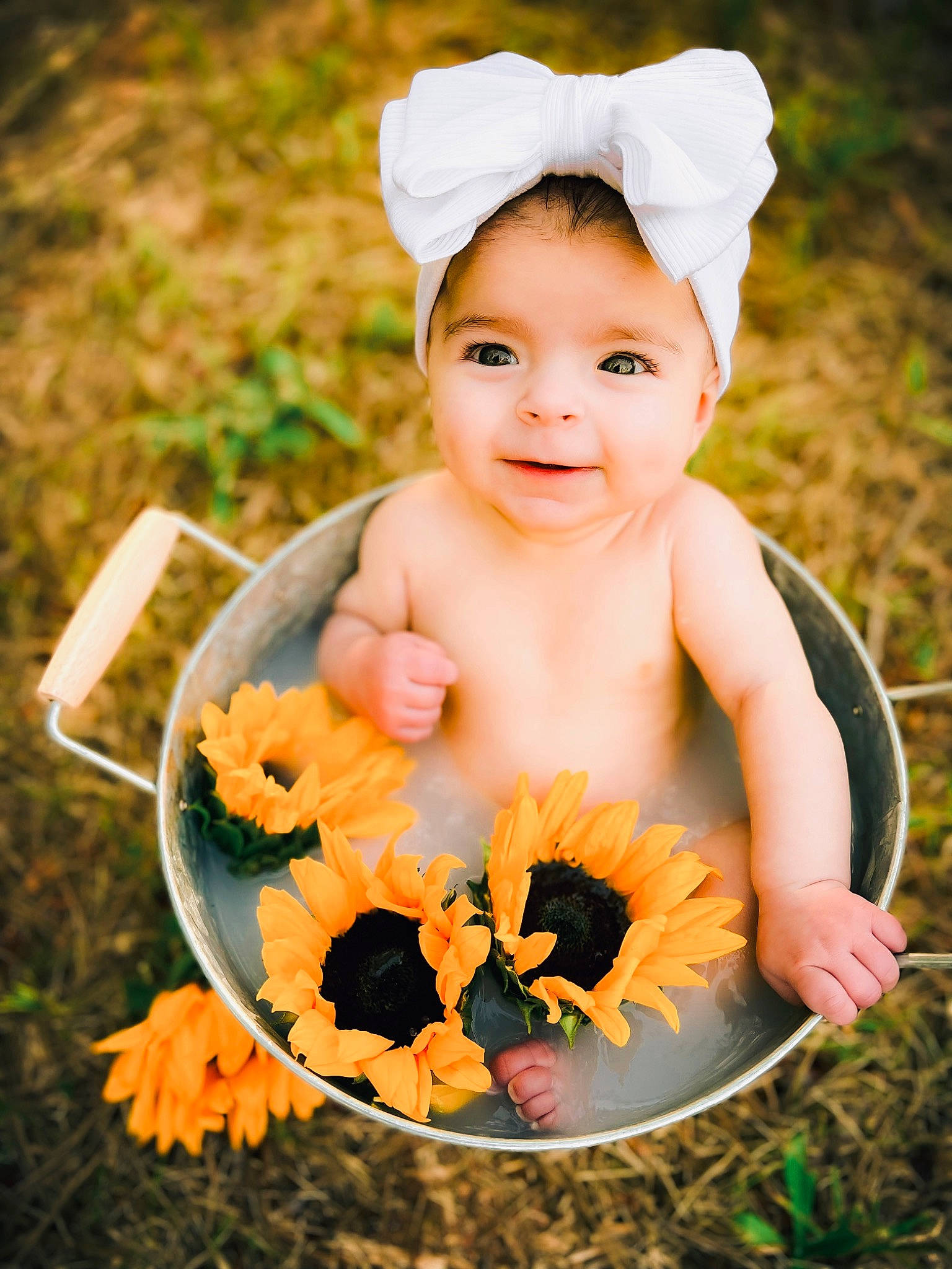 Emelie Giselle is registered to the contest to win money with this photo: baby, baby_toddler_clothing, cap, child, costume_hat, eye, fashion_accessory, flash_photography, fun, grass, hair_accessory, happy, headband, headpiece, jewellery, joy, people_in_nature, person, plant, portrait_photography