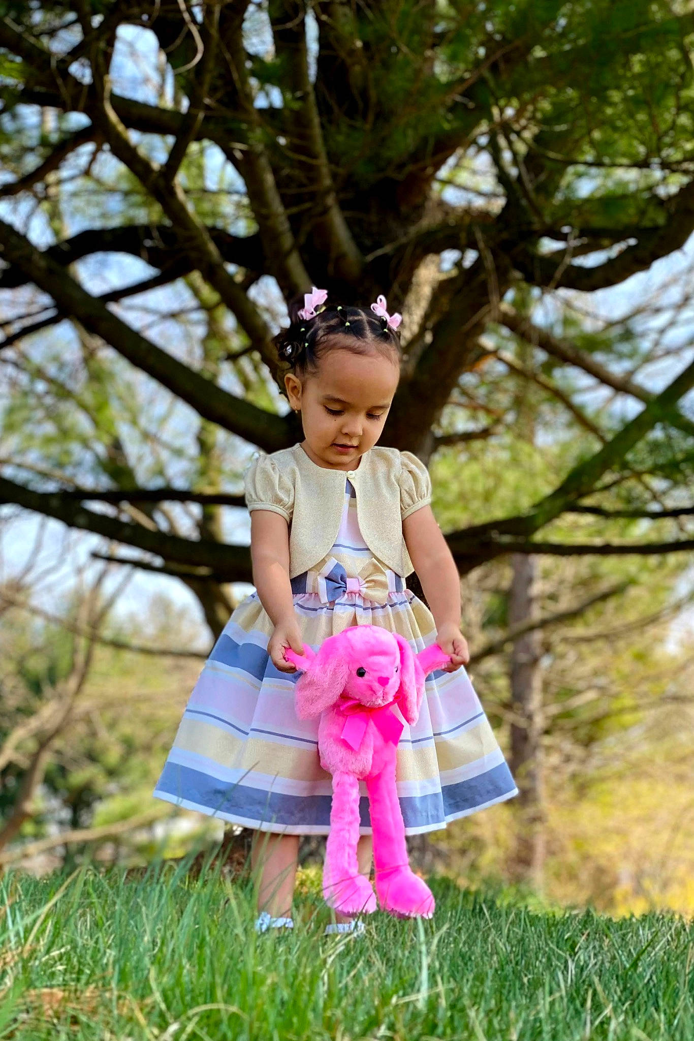 Janessa is registered to the contest to win money with this photo: baby, baby_toddler_clothing, child, dress, electric_blue, fawn, grass, grassland, happy, hat, leg, leisure, magenta, people_in_nature, person, pink, plant, summer, toddler, toy