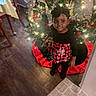 Miracle joined the competition — help win amazing prizes! child, christmas_tree, holiday, festive_clothing, smiling, indoors, decorations, lights, floor, carpet, headband, black_clothing, red_skirt, wooden_floor, home, celebration, girl, portrait, festive, happy