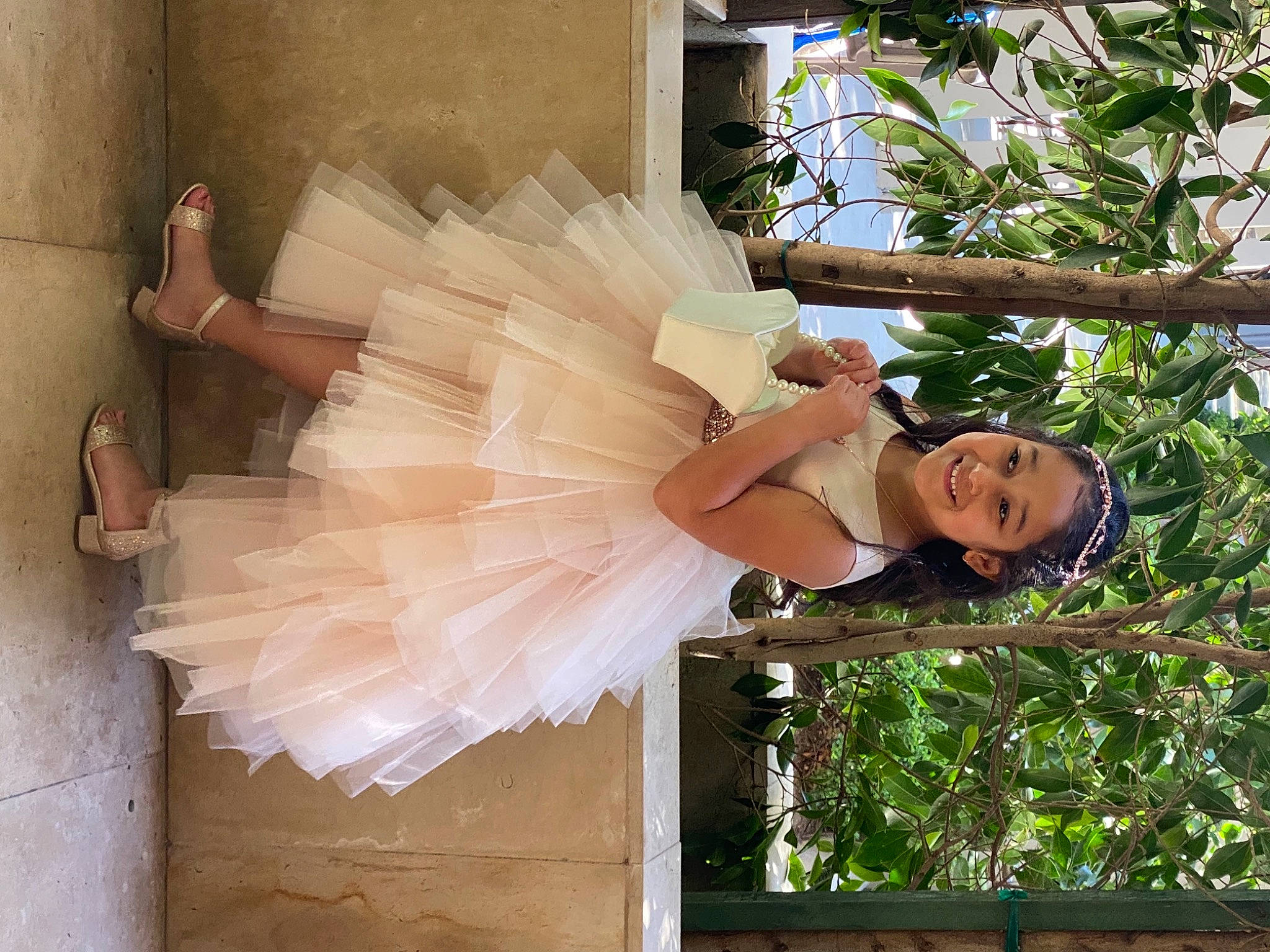 Sloane is registered to the contest to win money with this photo: bridal_accessory, bridal_clothing, dress, event, eyewear, fashion_accessory, fashion_design, feather, fun, fur, glove, gown, haute_couture, joy, peach, person, smile, tree, wedding_dress, wing