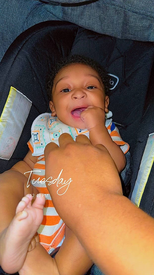 Josiah is registered to the contest to win money with this photo: baby, cheek, chest, comfort, eyebrow, finger, gesture, hair, hand, human_body, leg, lip, mouth, nail, neck, nose, person, skin, stomach, thigh