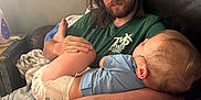 Keifton joined the competition — help win amazing prizes! man, child, toddler, diaper, couch, leather, beard, long_hair, cat, baby_wipes, sippy_cup, relaxing, indoor, casual_clothing, parenting, sleeping_child, home, furniture, hand, domestic_scene
