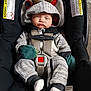 Elijah joined the competition — help win amazing prizes! baby, car_seat, onesie, reindeer_hood, antlers, mittens, socks, sleepy, child, infant, straps, black, gray_clothing, cute, indoors, seatbelt, toddler, expression, wearing_hood, resting