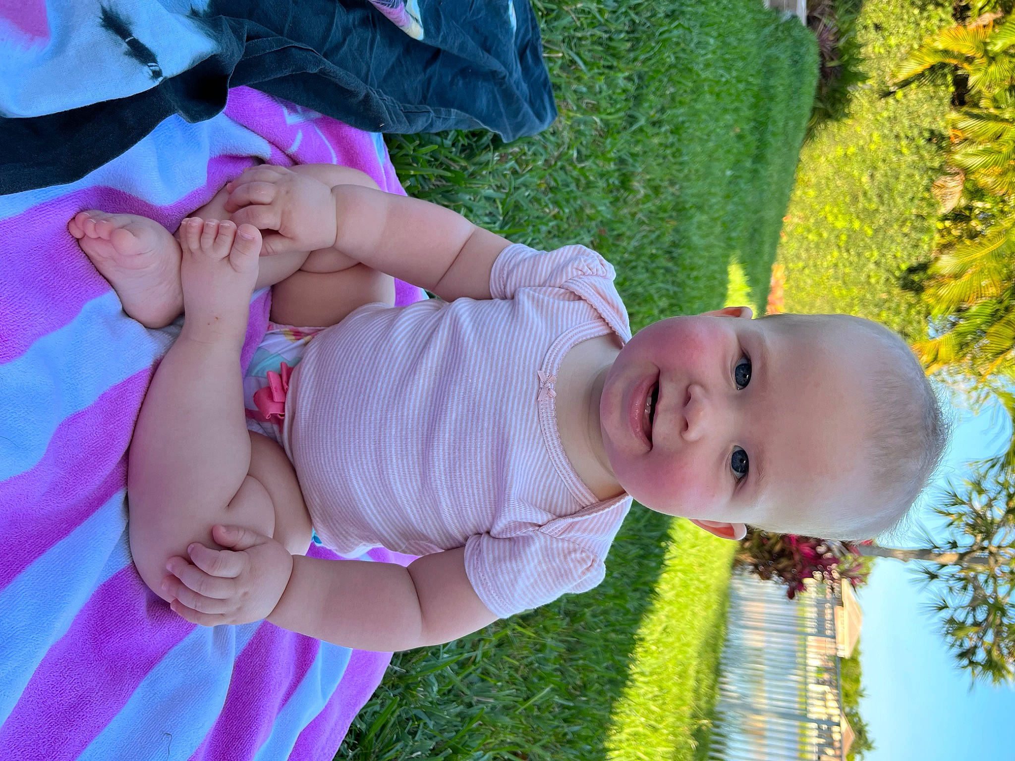 Bree joined the competition — help win amazing prizes! baby, child, fun, grass, green, hand, happy, hat, human_body, joy, leisure, people_in_nature, person, photograph, pink, plant, purple, red, smile, toddler