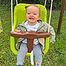 child, toddler, swing, green_swing, outdoor, grass, smiling, happy, jacket, leggings, shoes, playground, rope, nature, daylight, person, baby, park, fun, cute