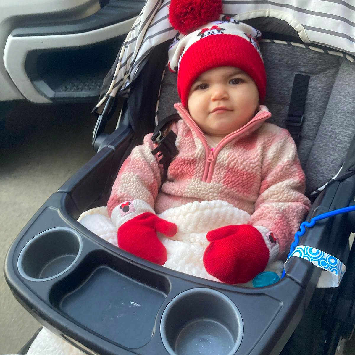 Navleen joined the competition — help win amazing prizes! baby, bonnet, cap, car, car_interior, carseat, clothing, coat, face, happy, hat, head, jacket, person, photography, portrait, selfie, smile, transportation, vehicle