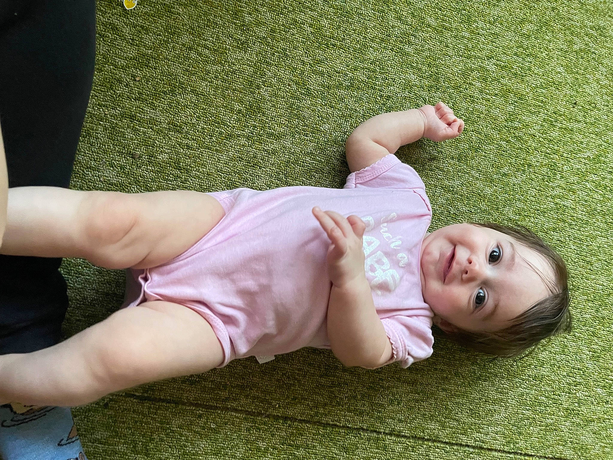 Alice joined the competition — help win amazing prizes! baby, baby_toddler_clothing, barefoot, child, finger, flooring, foot, fun, grass, happy, human_leg, joy, knee, leg, leisure, meadow, people_in_nature, person, skin, smile