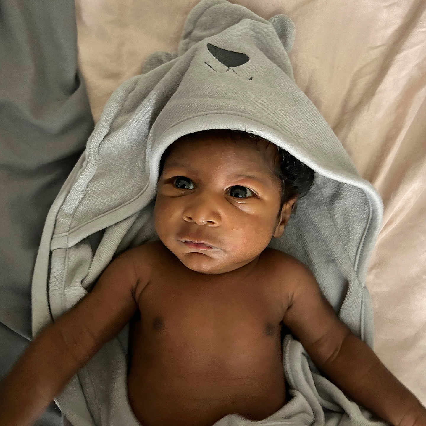 Zaire is registered to the contest to win money with this photo: baby, blanket, face, happy, head, person, photography, portrait, smile, towel
