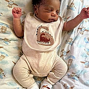 Jream joined the competition — help win amazing prizes! baby, sleeping, infant, bib, clothing, patterned_sheet, teddy_bear, airplane, arms_up, cozy, cute, newborn, socks, peaceful, resting, soft_texture, child, portrait, indoors, laying_down