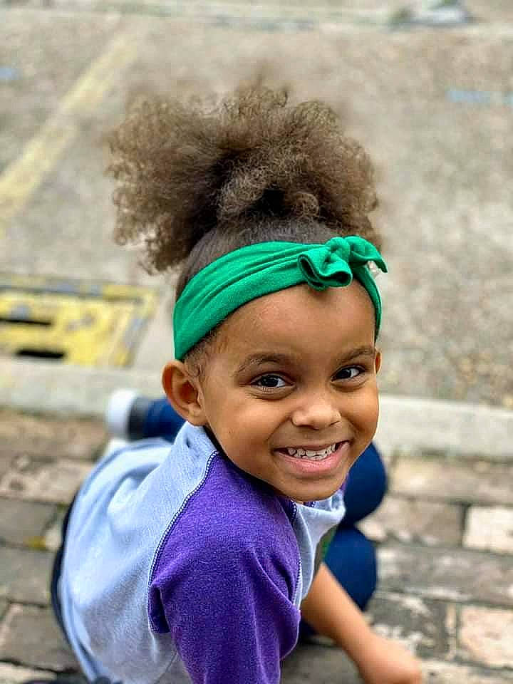 Giavonna joined the competition — help win amazing prizes! afro, child, ear, fashion_accessory, hair, hair_accessory, hairstyle, headband, headgear, headwear, joy, people, person, smile, toddler