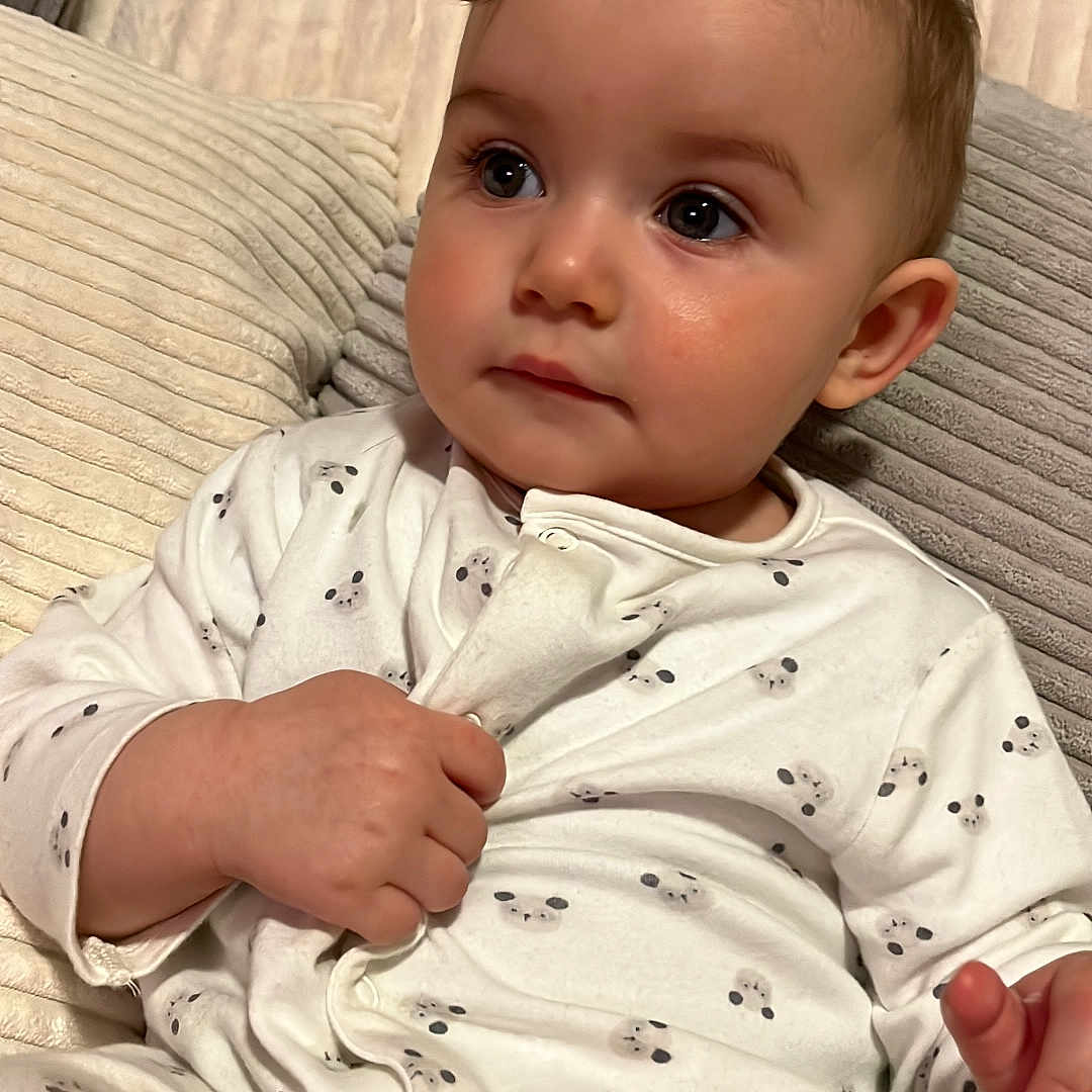 Philippa joined the competition — help win amazing prizes! baby, blanket, bodypart, clothing, couch, cushion, face, finger, furniture, hand, happy, head, homedecor, newborn, person, photography, portrait, quilt, sitting, smile