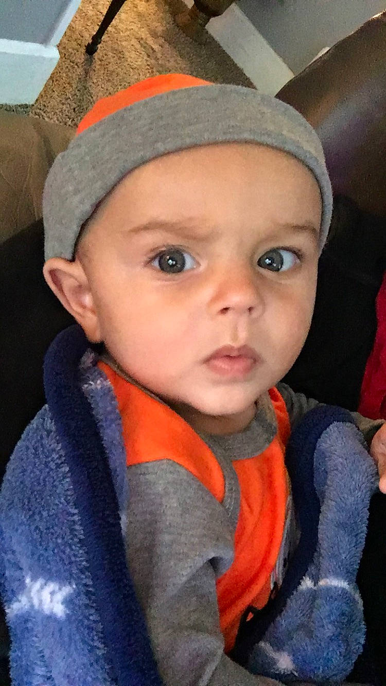 Hassan is registered to the contest to win money with this photo: baby, beanie, bonnet, cheek, child, chin, eye, eyebrow, face, forehead, head, headgear, headwear, knit_cap, lip, nose, person, skin, smile, toddler