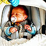 Maylan a rejoint le concours — aidez-le/la à gagner de superbes lots ! newborn, baby, sleeping, pacifier, blanket, car_seat, blue_striped_toy, clothing, infant, cute, peaceful, resting, hand, face, head, soft, comfort, indoors, child, baby_accessory