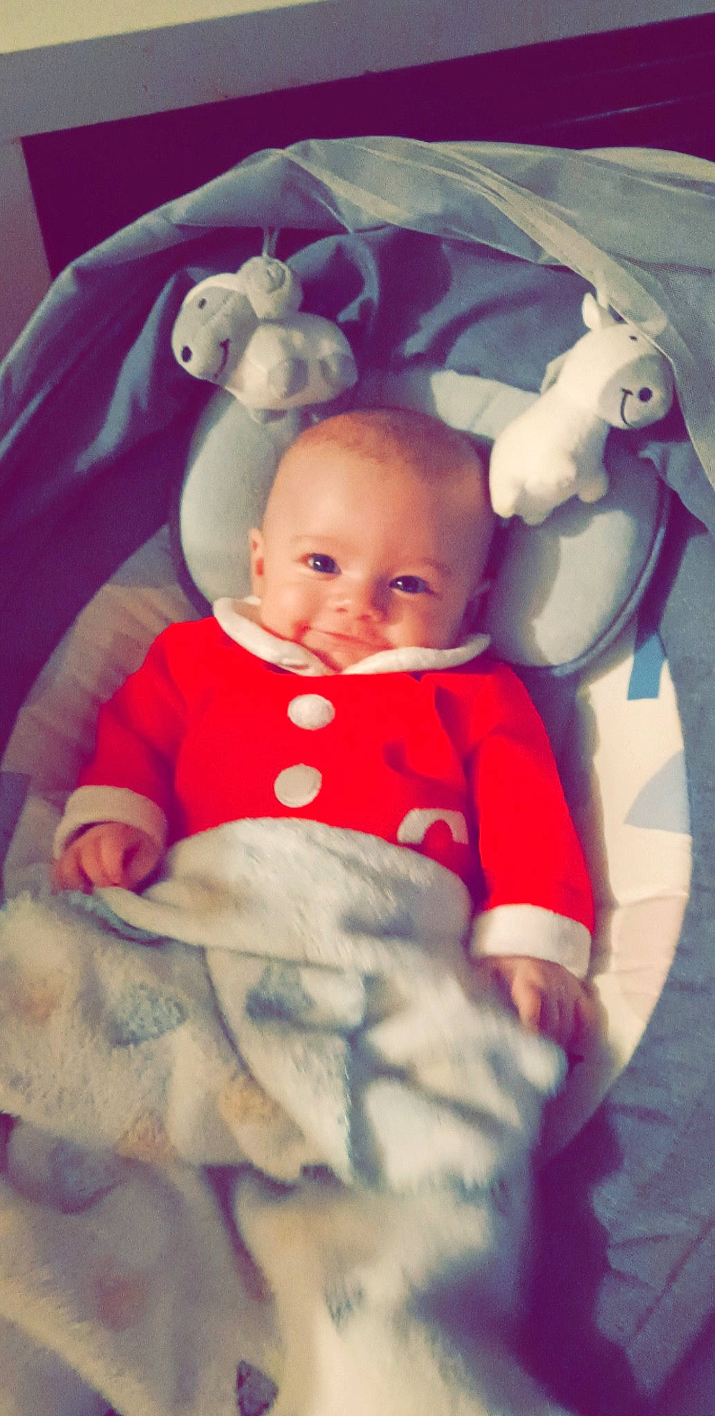 Tommy participe au concours pour gagner de l'argent avec cette photo : baby, baby_carriage, baby_products, baby_toddler_clothing, cheek, child, comfort, happy, human_body, linens, mouth, person, pink, plush, sitting, skin, sleeve, smile, stuffed_toy, textile