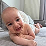 Yzac participe au concours pour gagner de l'argent avec cette photo : baby, smiling, infant, couch, arm, face, skin, happy, indoors, head, child, expression, lying_down, cheeks, person, furniture, comfort, closeup, cute, young