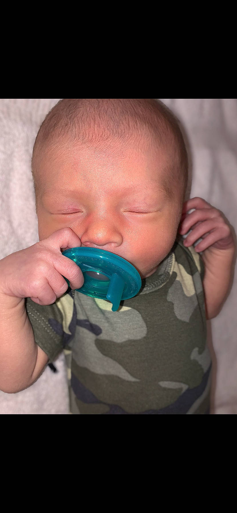 Kyuss is registered to the contest to win money with this photo: baby, baby_toddler_clothing, cheek, child, drink, drinking, drinkware, ear, eyelash, facial_hair, finger, gesture, hand, human_body, mouth, nail, nose, person, plastic_bottle, thumb