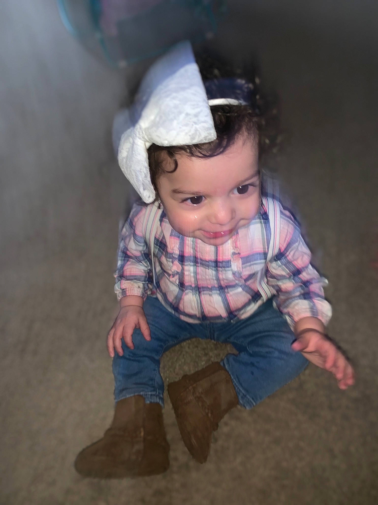 Ocean is registered to the contest to win money with this photo: baby, cheek, child, eye, head, headgear, headwear, iris, joy, pattern, people, person, photography, plaid, play, sitting, skin, smile, standing, toddler