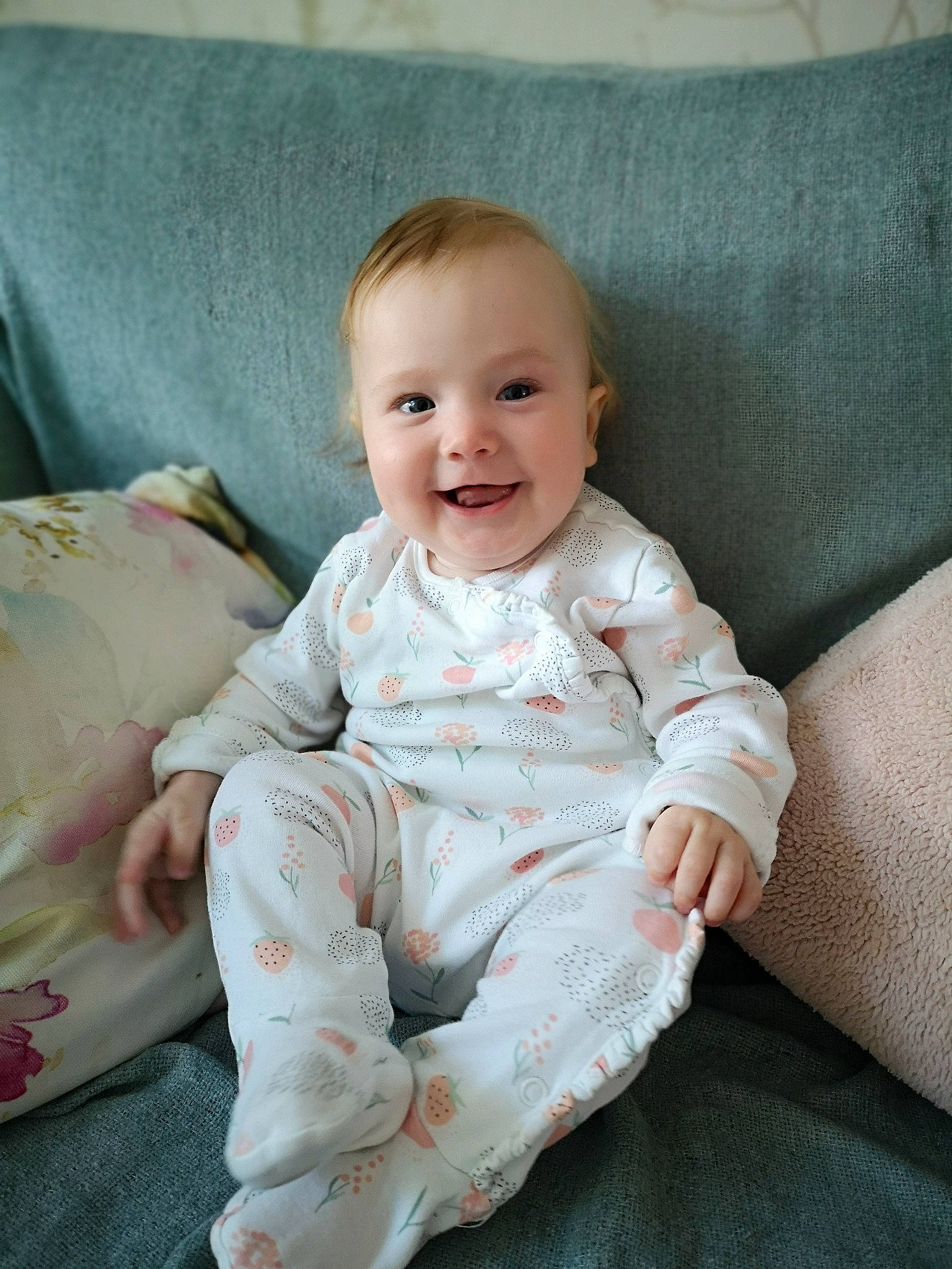 Isla joined the competition — help win amazing prizes! baby, baby_toddler_clothing, cheek, child, collar, comfort, couch, eye, face, foot, happy, head, iris, joy, linens, pattern, person, sitting, skin, sleeve